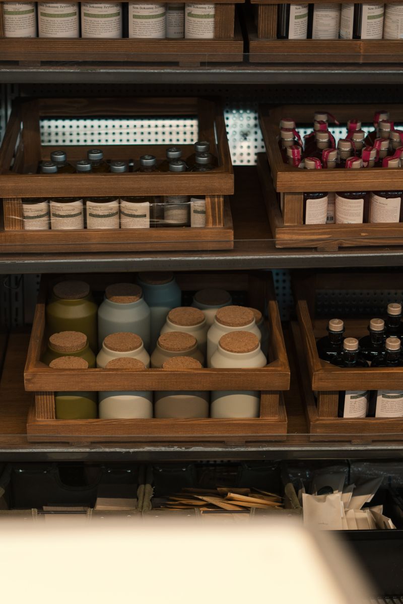 Glass jars of cannabis products on dispensary shelves